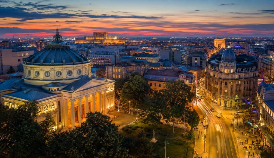 Bucharest at dusk: the Romanian Athenaeum and Calea Victoriei